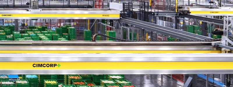 Cimcorps portalkranrobotar hanterar containrar med färska livsmedel i ett automatiserat lager. Foto: Cimcorp